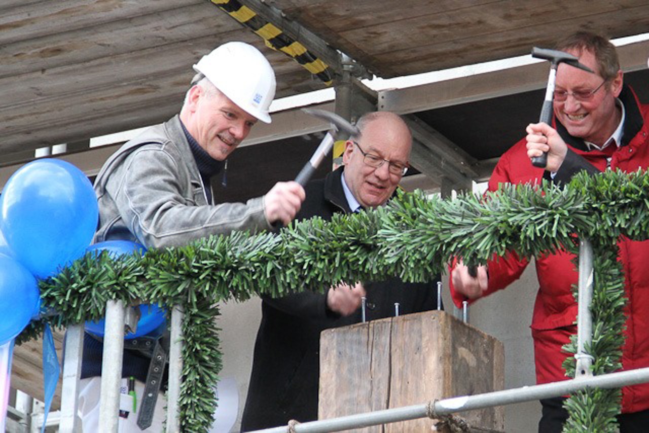 Bürgermeister Roland Mehtling und WG-Union-Vorstand Gunnar Przybill und Volker Fritz