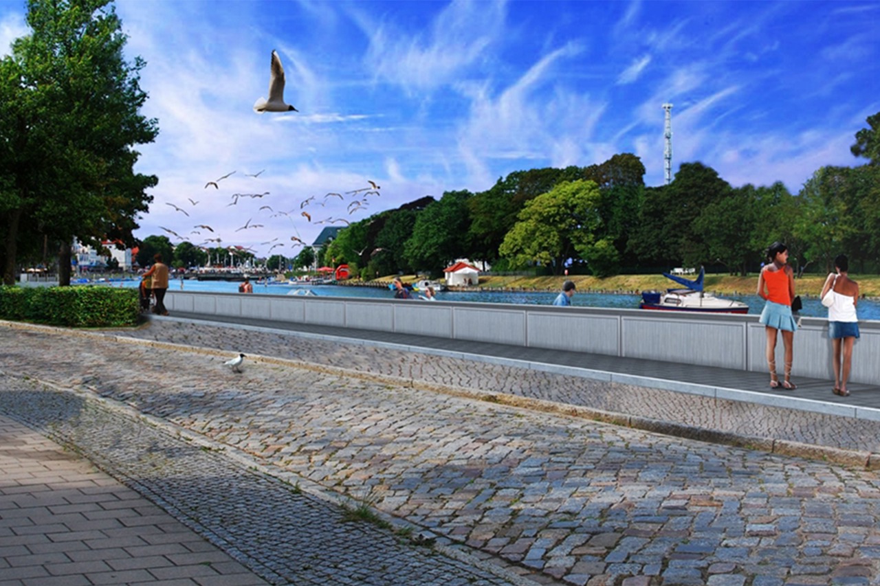 Die neue Sturmflutschutzmauer am Südende des Alten Stroma in Warnemünde soll nicht viel höher werden, aber aufstockbar sein - Visualisierung mit Beton, Blick von Land (Quelle: Frank Schmidt-Garling)