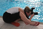 Fotografin beim Drachenboot Indoor Cup in der Neptunschwimmhalle