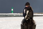 Junge Reiterin beim Warnemünder Wintervergnügen 2012